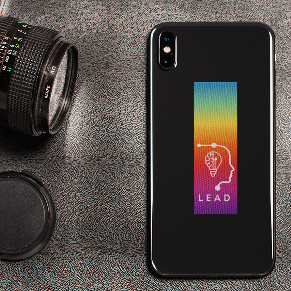 Vertical sensory sticker strip with custom Brain logo applied to phone back
